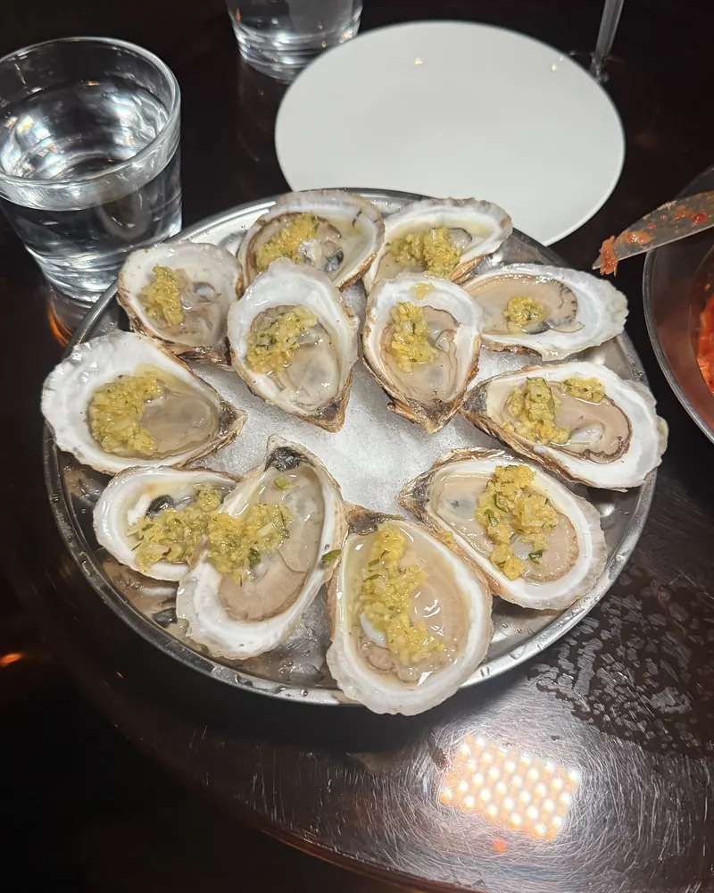 Oysters on the half shell served on a platter of ice